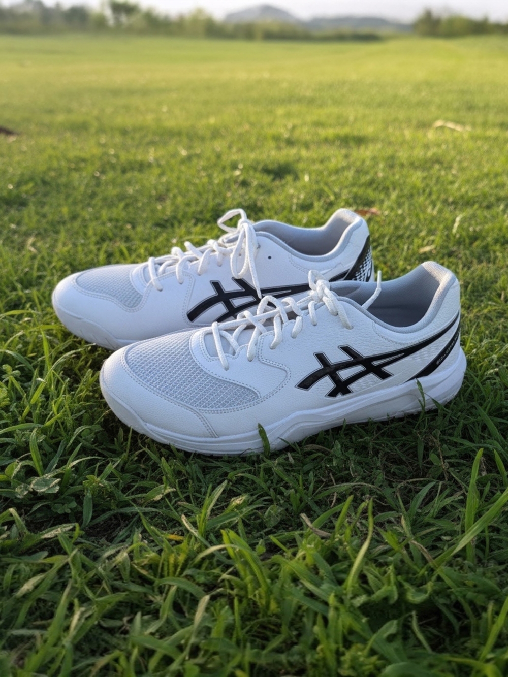 Asics White Athletic Sneakers with Black Logo